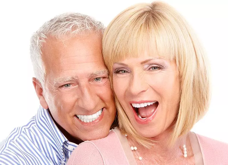 senior couple smiling